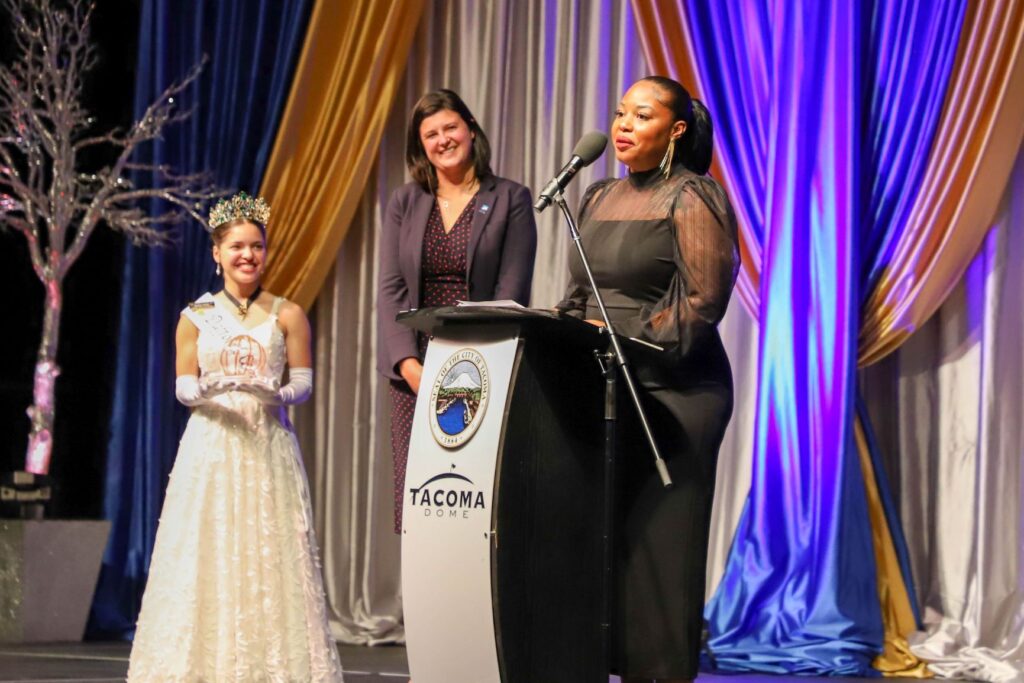 Awards ceremony with people at the podium
