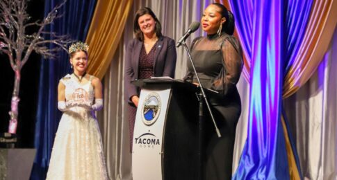 Awards ceremony with people at the podium