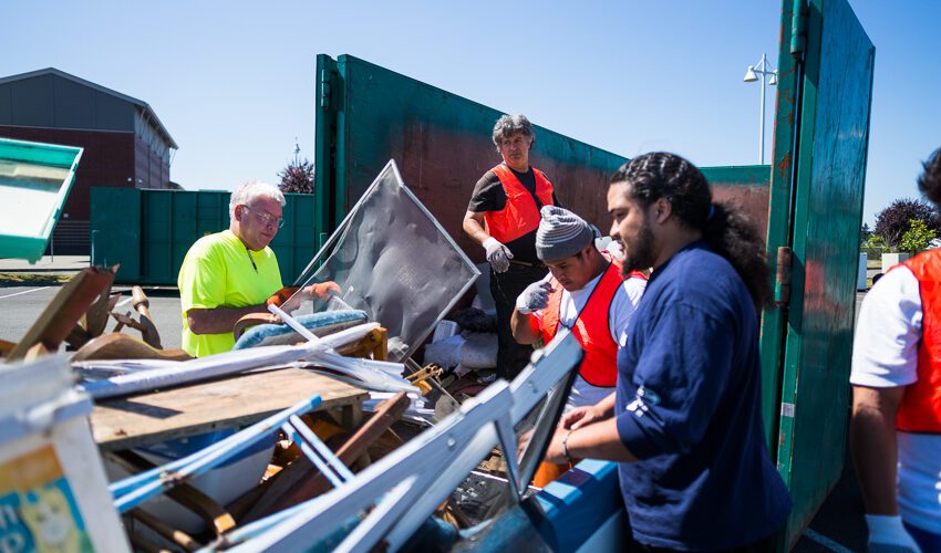 community volunteers cleaning up junk