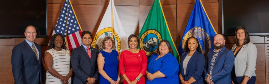 Photo of the Tacoma City Council in Council Chambers.