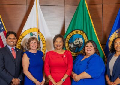 Photo of the Tacoma City Council in Council Chambers.