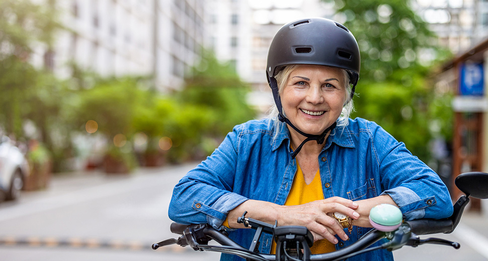 Woman With Bike and Helmet