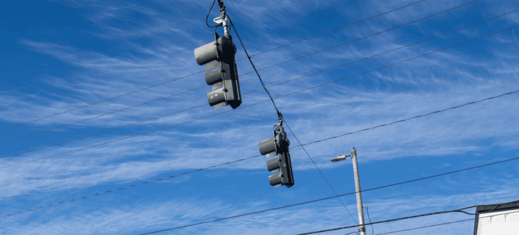 Photo of traffic signals above a Tacoma intersection