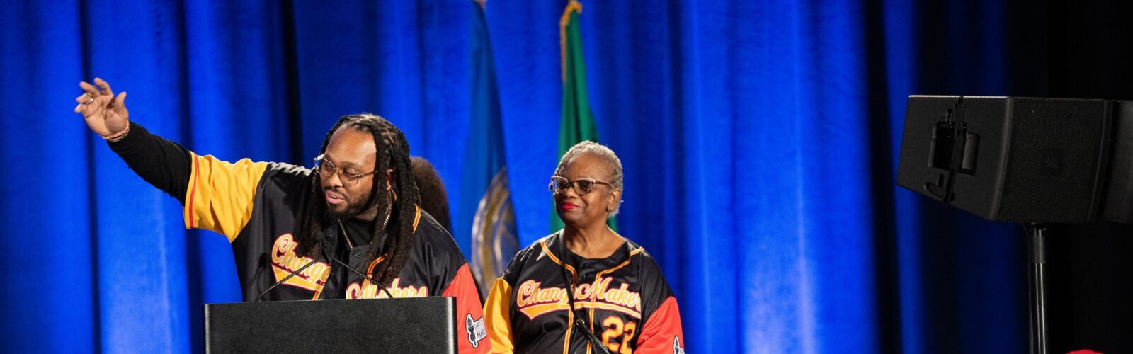 Brian Gatewood Sr. accepting award on stage at Dr. Martin Luther King, Jr. Celebration 2025