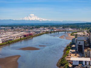 This is an Arial view of Mt. Rainier, Port of Tacoma and the Tide Flats using a drone.