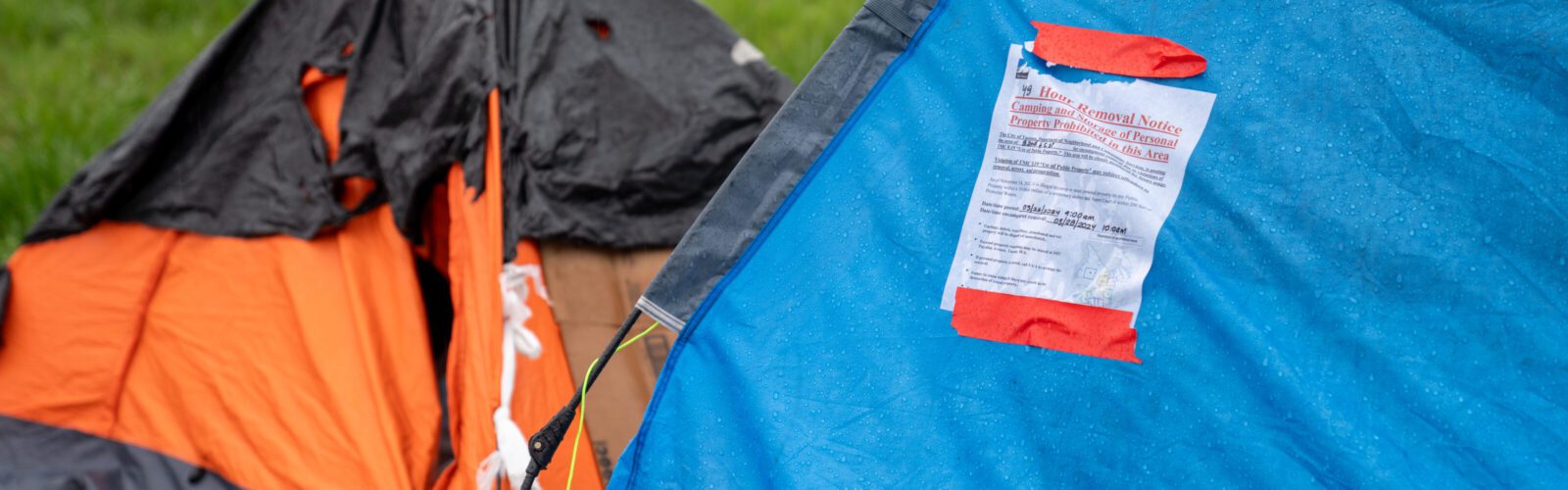 Encampment notice on tent.