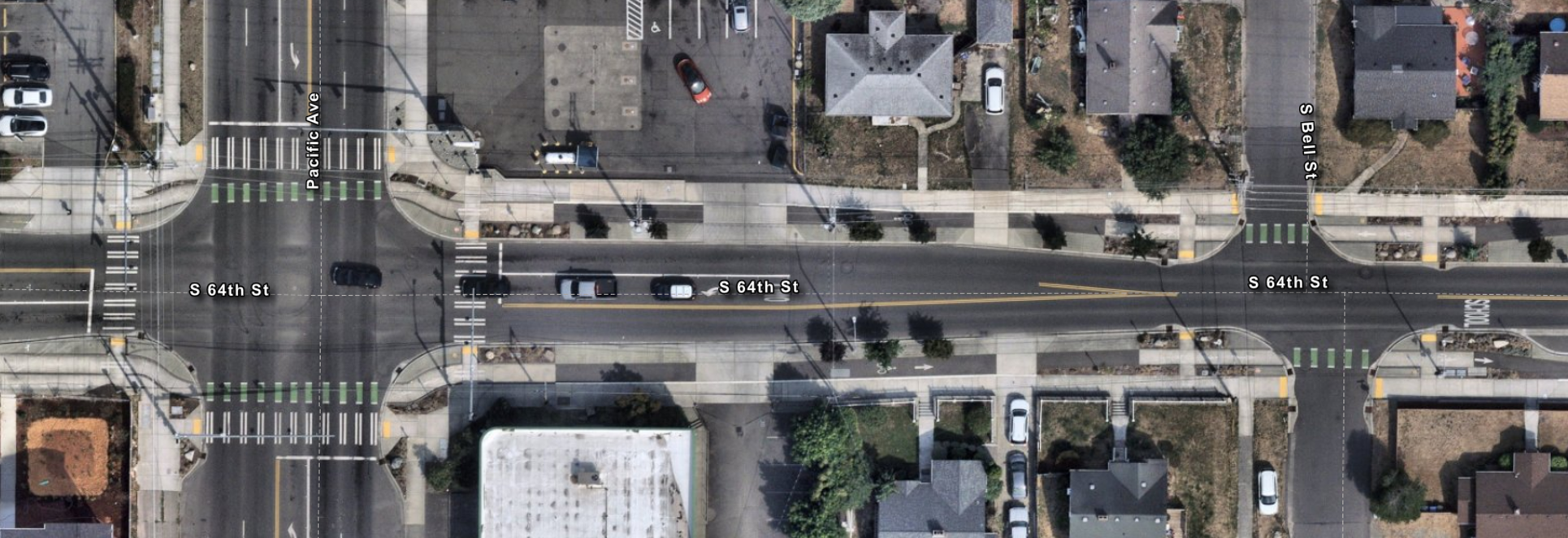 Aerial imagery of East 64th Street Between Pacific Ave and S Bell St, after 64th Street project