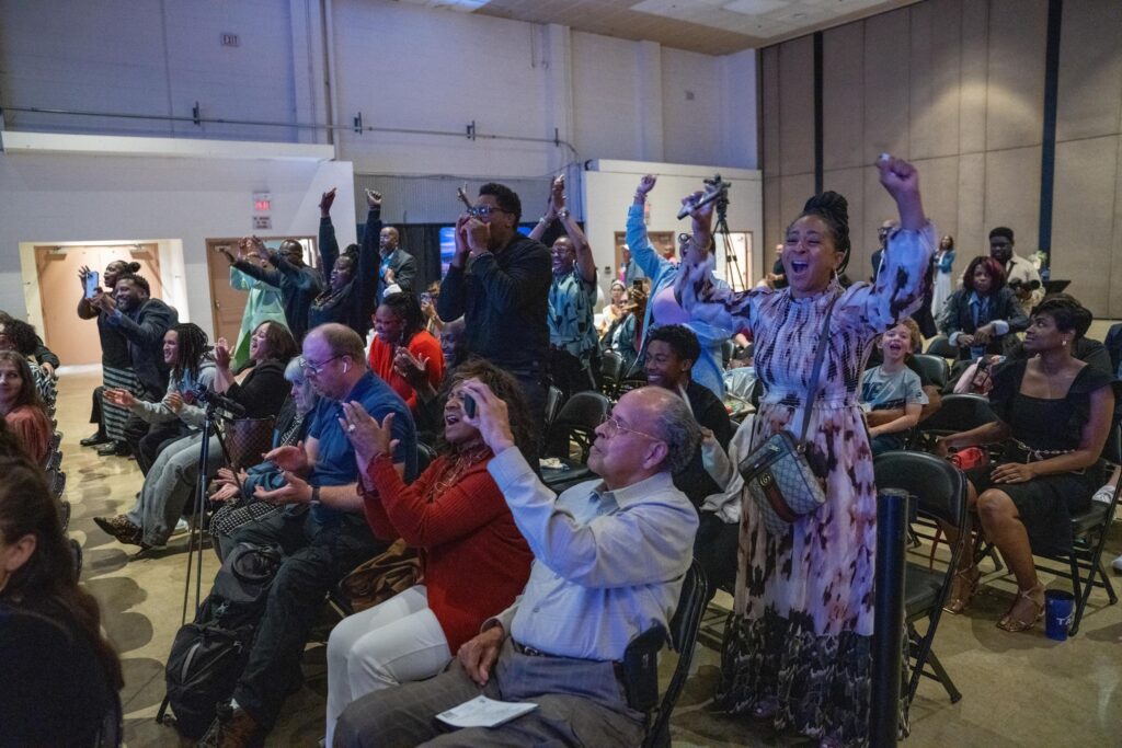 People cheering at the City of Destiny Awards