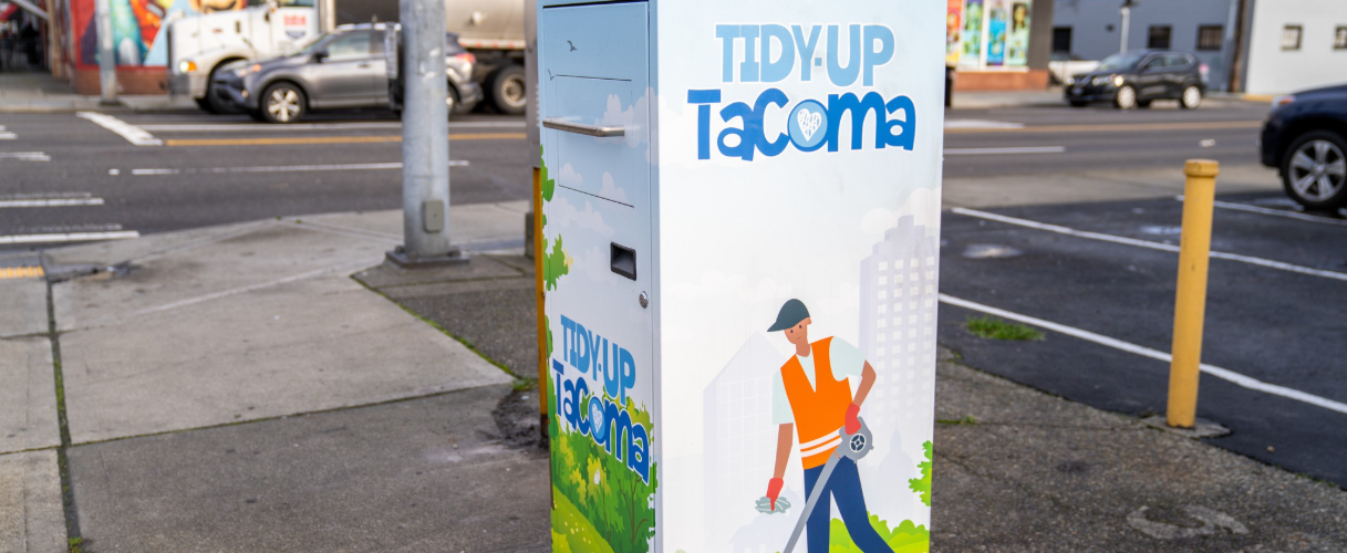 public garbage can on street corner downtown Tacoma.